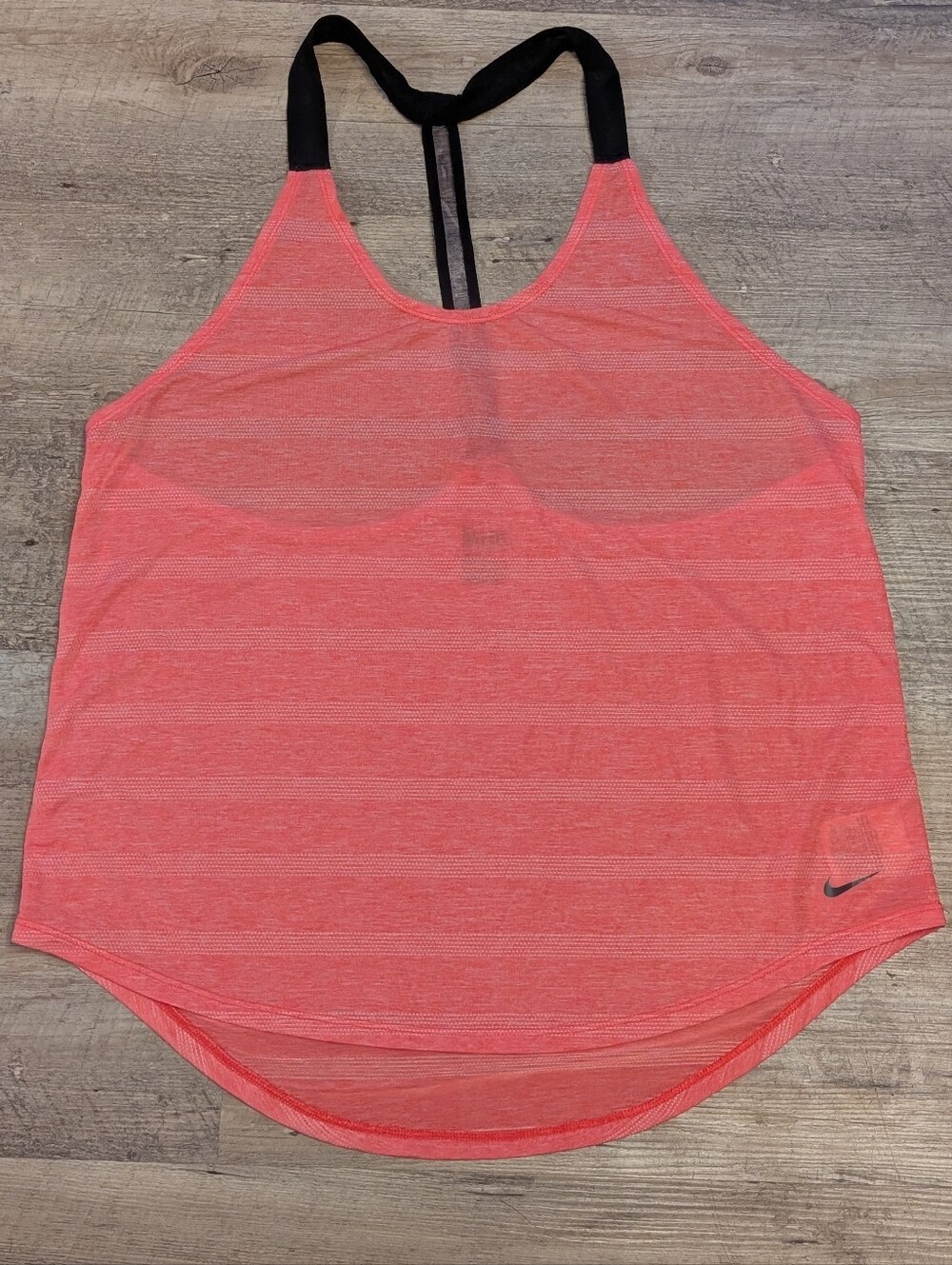 Nike pink/salmon colored razor back tank top W/ Mesh Stripe Design. Size Large
